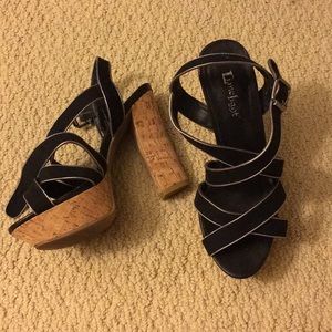 Woman’s black strap heel